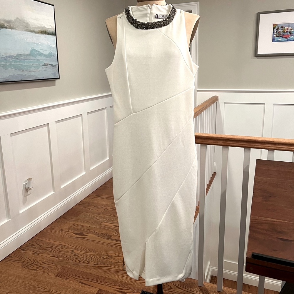 Jennifer Lopez cocktail dress in Ivory, Size 2.